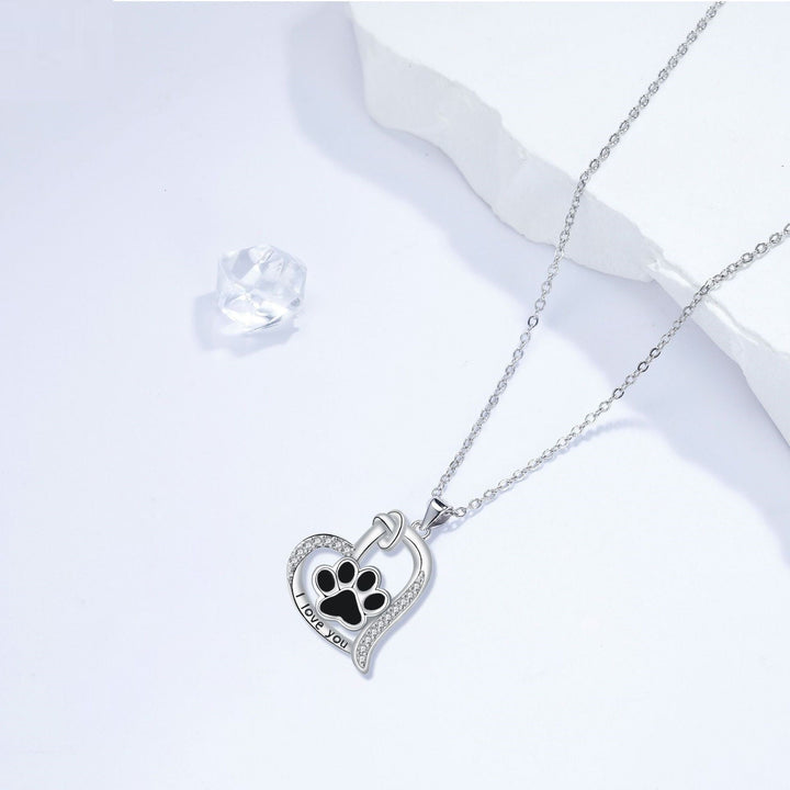 Emily & Isabella Brooks | Heart-shaped Dog Paw Print Necklace in Silver with Zirconia