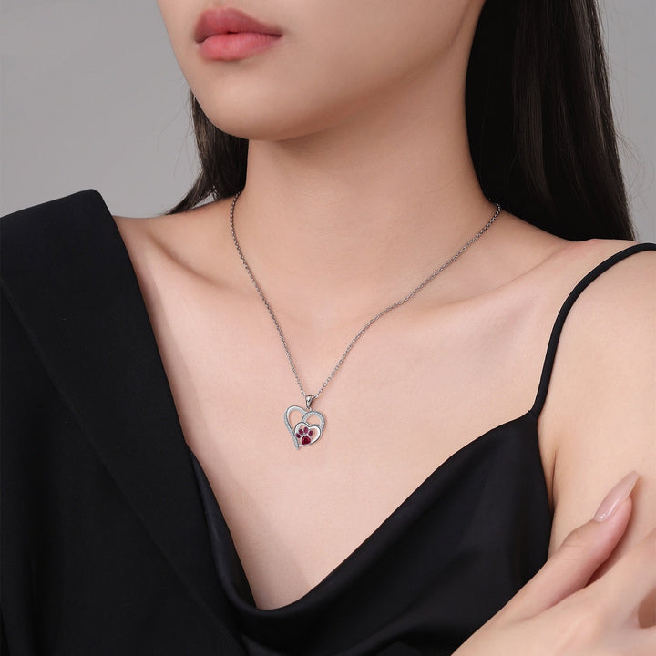 Emily & Isabella Brooks | Paw Print Necklace