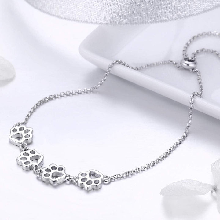 Emily & Isabella Brooks | Sterling Silver Paw Print Bracelet - Adjustable Fit