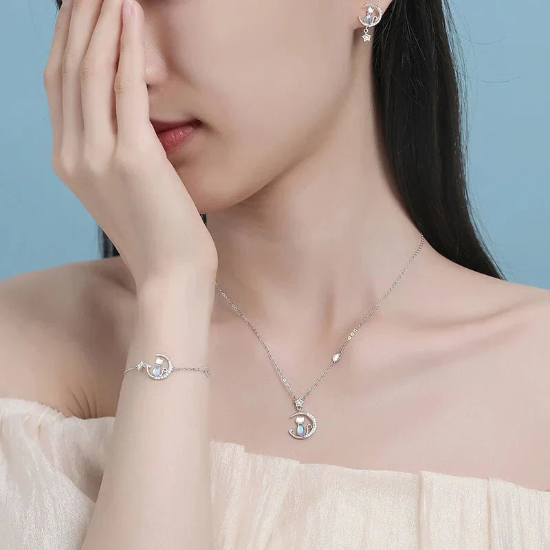Emily & Isabella Brooks | Sterling Silver Moon and Star Cat Earrings with Zircon
