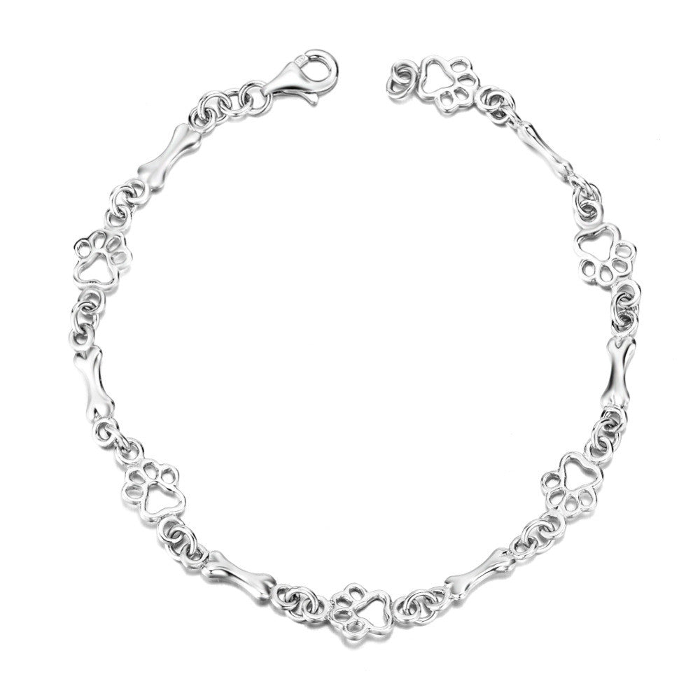 Emily & Isabella Brooks | Pure Silver Dog Paw and Bone Charms Bracelet