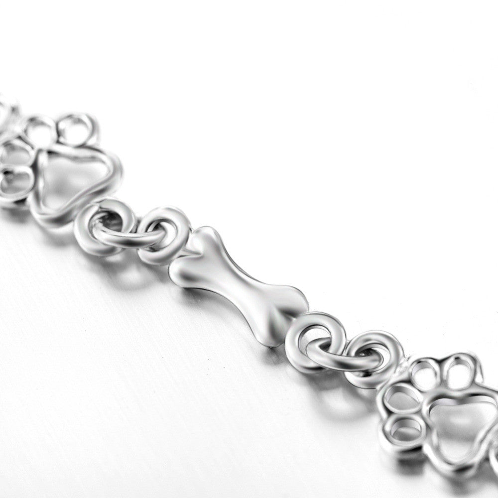Emily & Isabella Brooks | Pure Silver Dog Paw and Bone Charms Bracelet