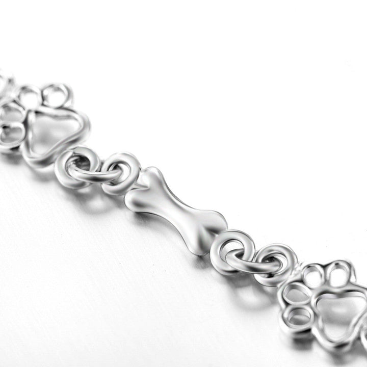 Emily & Isabella Brooks | Pure Silver Dog Paw and Bone Charms Bracelet
