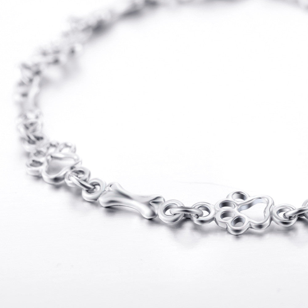 Emily & Isabella Brooks | Pure Silver Dog Paw and Bone Charms Bracelet