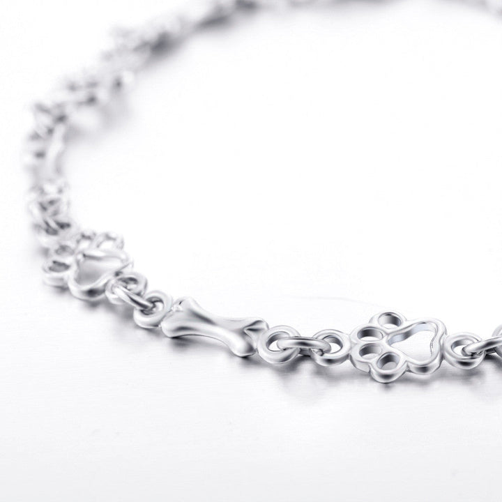 Emily & Isabella Brooks | Pure Silver Dog Paw and Bone Charms Bracelet