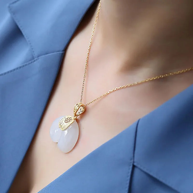 Emily & Isabella Brooks | Hetian Jade Elephant Pendant Necklace – 18K Gold Plated Chain