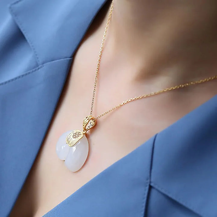 Emily & Isabella Brooks | Hetian Jade Elephant Pendant Necklace – 18K Gold Plated Chain