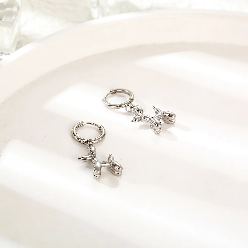 Emily & Isabella Brooks | Gold Huggie Earrings with Charm