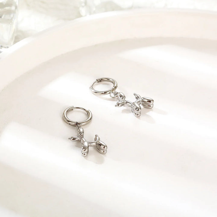Emily & Isabella Brooks | Gold Huggie Earrings with Charm