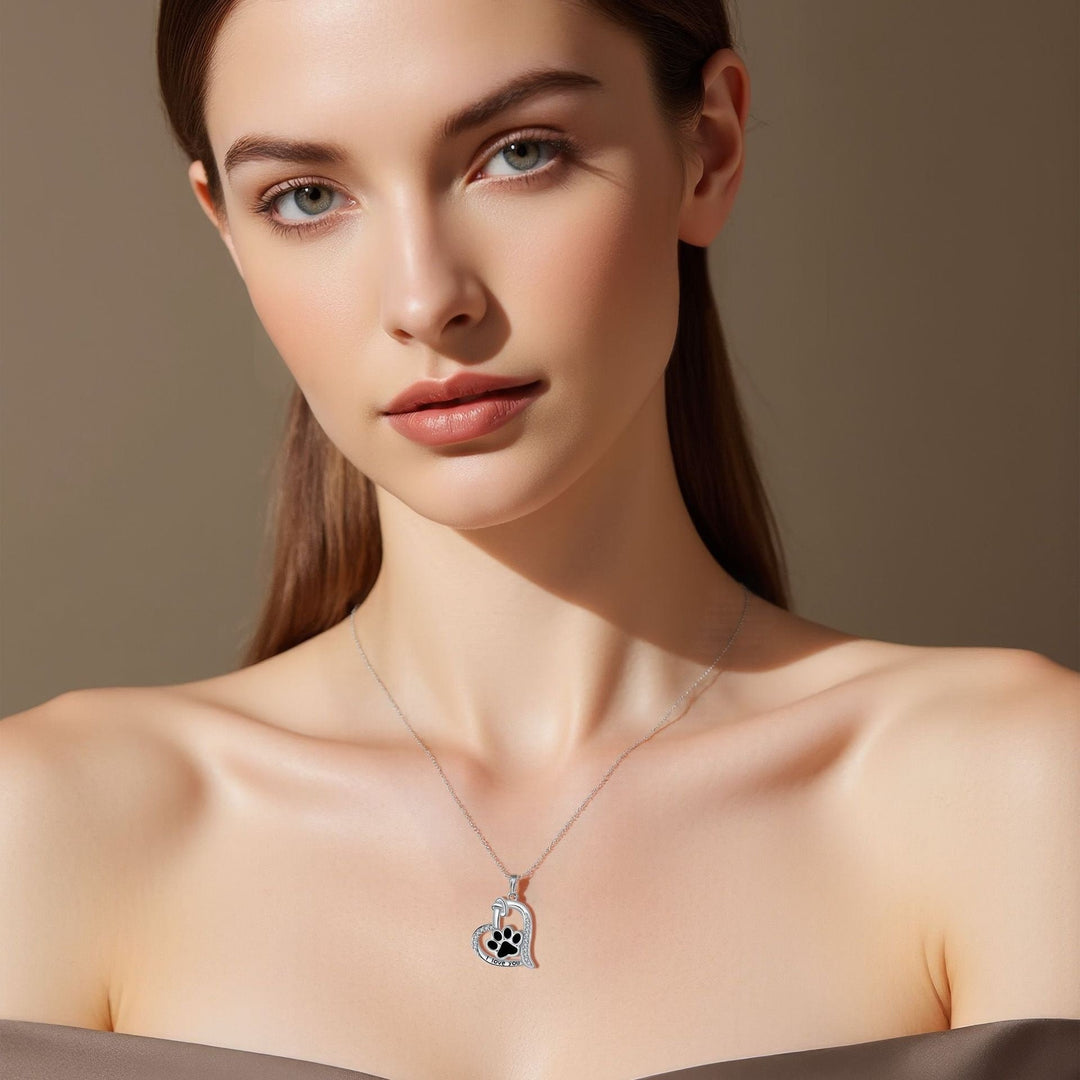 Emily & Isabella Brooks | Heart-shaped Dog Paw Print Necklace in Silver with Zirconia