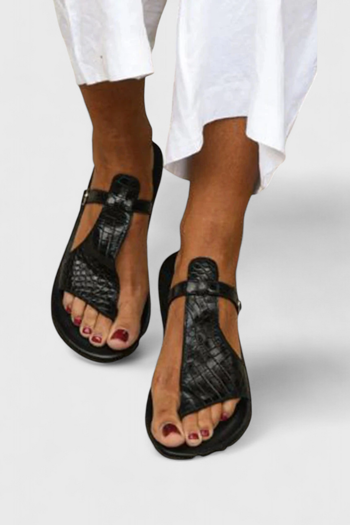 Emily & Isabella Brooks | Black Buckle Sandals with Embossed Animal Print Detail